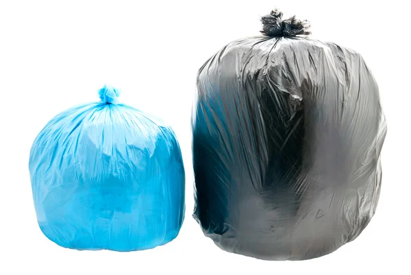 Синие и черные пакеты для мусора — стоковое фото