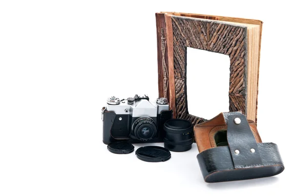 Camera and album — Stock Photo, Image