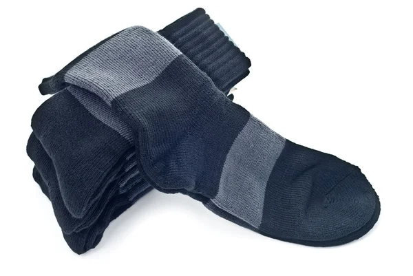 Stapel zwarte sokken — Stockfoto