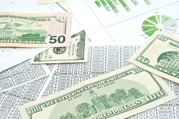 Dollars and diagrams — Stock Photo, Image