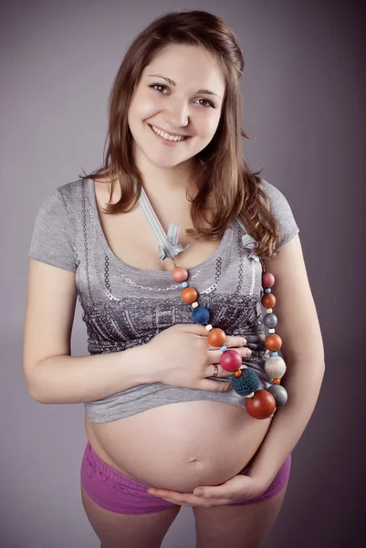 Mujer embarazada divertida — Foto de Stock
