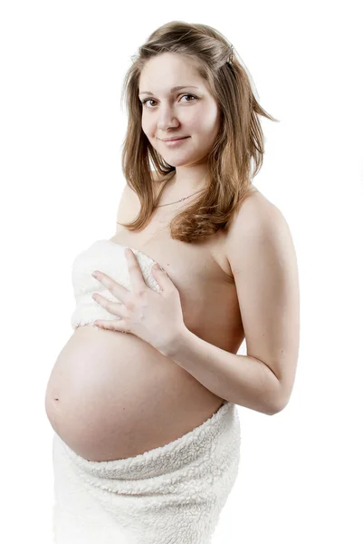 Έγκυος γυναίκα σε μια λευκή γούνα — Φωτογραφία Αρχείου