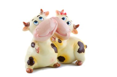 Two ceramic cows. clipart