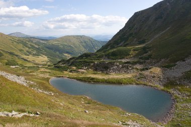 Brebenskul lake in Carphatian mountains. clipart