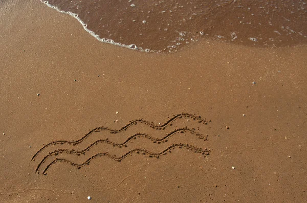 Welle auf Sand. — Stockfoto