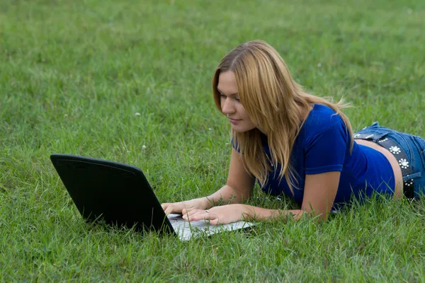 stock image Girl working on laptop.