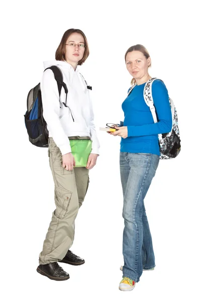 Dos estudiantes con mochila y cuaderno . — Foto de Stock