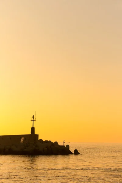 Sylwetki w zachód słońca, marciana marina, wyspa elba — Zdjęcie stockowe