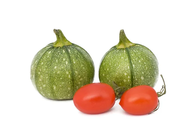 Runde Zucchini und Tomaten — Stockfoto
