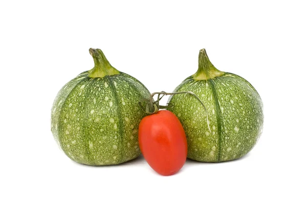 Runde Zucchini und Tomaten — Stockfoto
