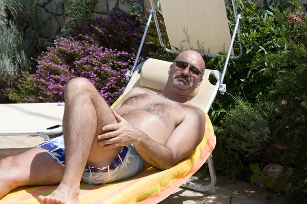 Man Sunbathing In The Garden — Stock Photo, Image