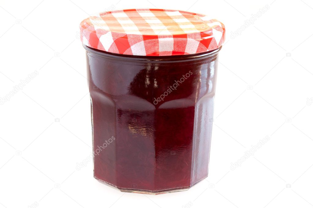 Food - Canned food - Jar with cherry jam isolated on white background.