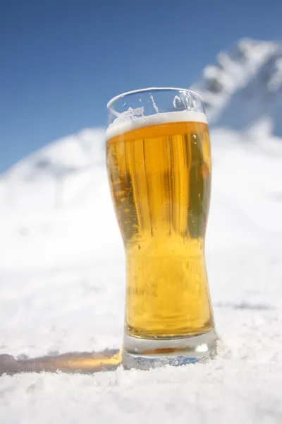 Beer glass over Alps — Stock Photo, Image