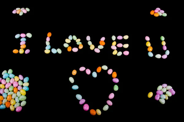 Ich liebe u Text mit Süßigkeiten — Stockfoto