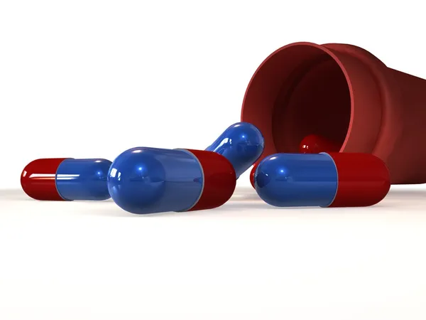Красные голубые таблетки — стоковое фото