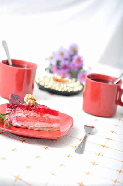 Fruit dessert with tea and napkin — Stock Photo, Image