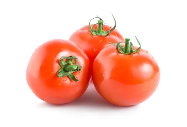 Τρεις κόκκινες ντομάτες απομονωθεί — Φωτογραφία Αρχείου