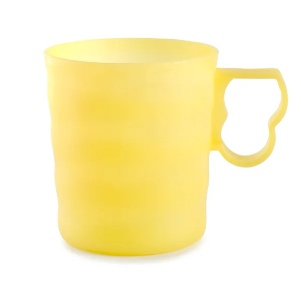 Yellow plastic mug — Stock Photo, Image