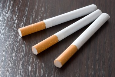 Cigarettes on the table clipart