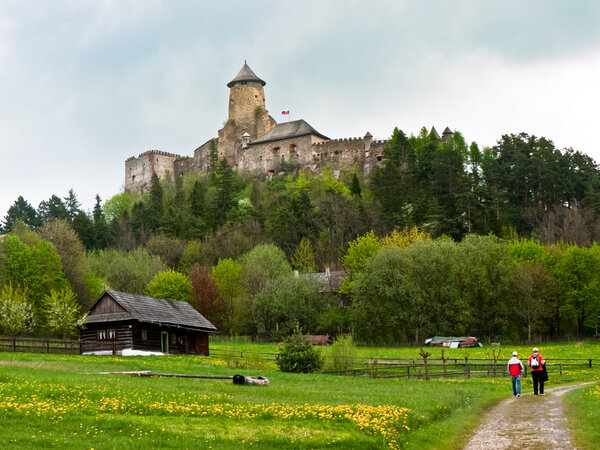 Old castle and open air museum with tourist visitors