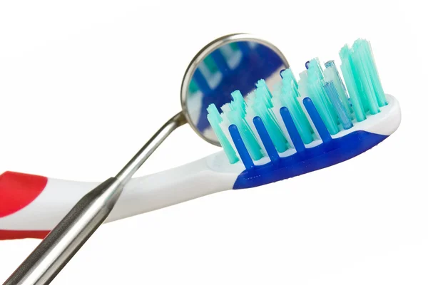 Cepillo de dientes y herramientas dentales Imagen de archivo