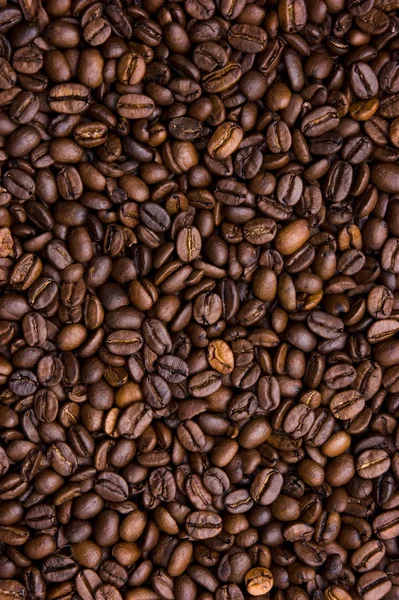 Background of black coffee beans — Stok fotoğraf