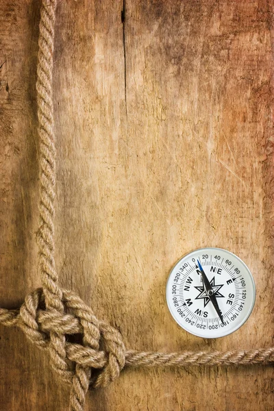 Compass with a rope — Stock Photo, Image