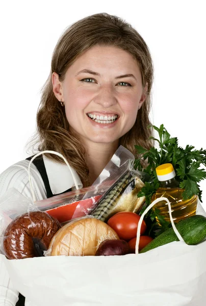 白い背景の上の食料品の袋を保持している禎女性 — ストック写真