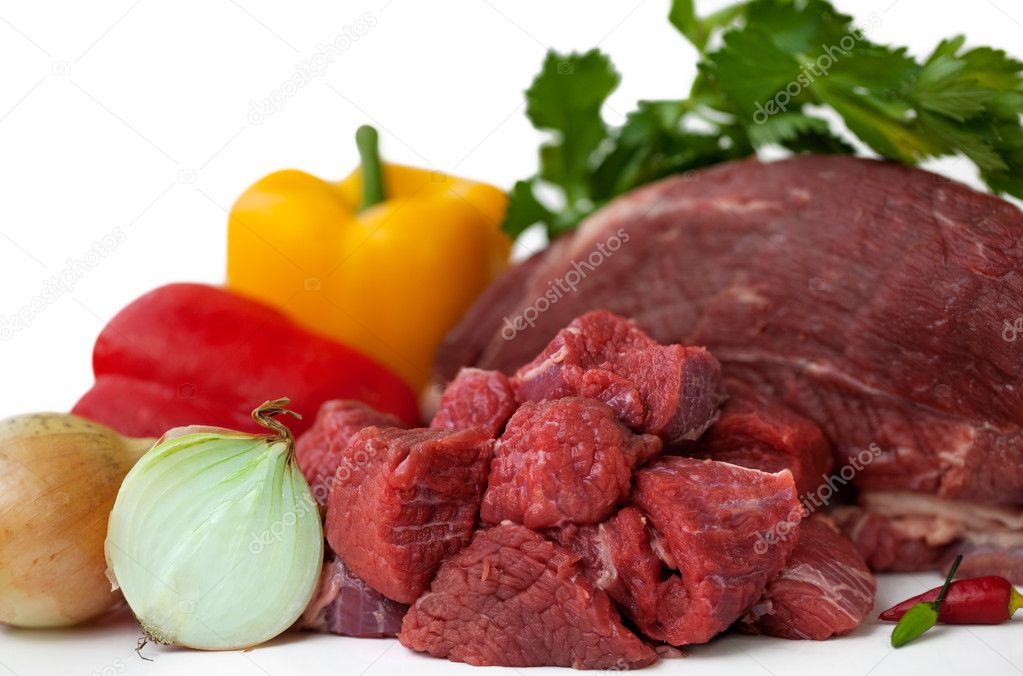 Chunks of lean beef, ready for making beef stew or hearty chili or Goulash with Ingredient. Isolated on white.