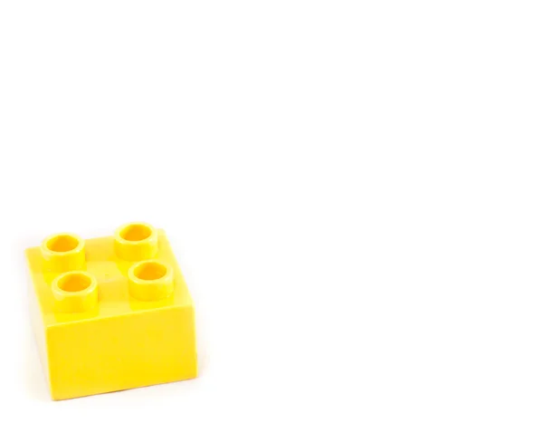 stock image Plastic building blocks on white background. Bright colors.