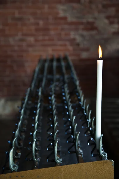 Hope: candle in abbey — Stock Photo, Image
