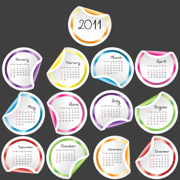 2011 Calendar with colored stickers on grey background — Stock Photo, Image