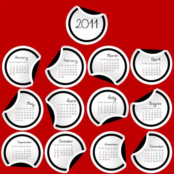 2011 Calendar with stickers with black borders on red background — Stock Photo, Image
