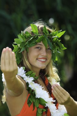 Hawaiian hula danced by a teenage girl clipart