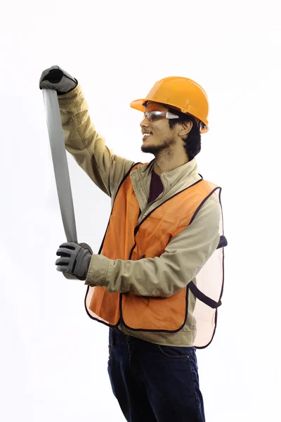 Workman in hardhat with duct tape — Stock Photo, Image