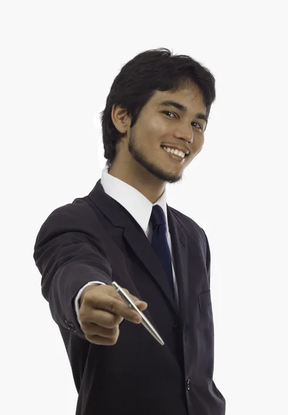 Salesman offering a pen — Stock Photo, Image