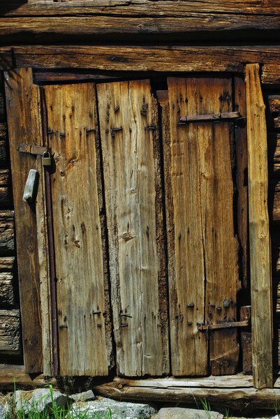 Close-up image of ancient wooden door