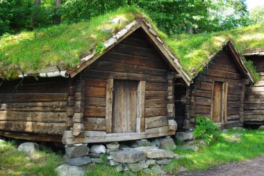 Ancient fisherman's wooden huts in ethnic park of Alesund, Norway clipart