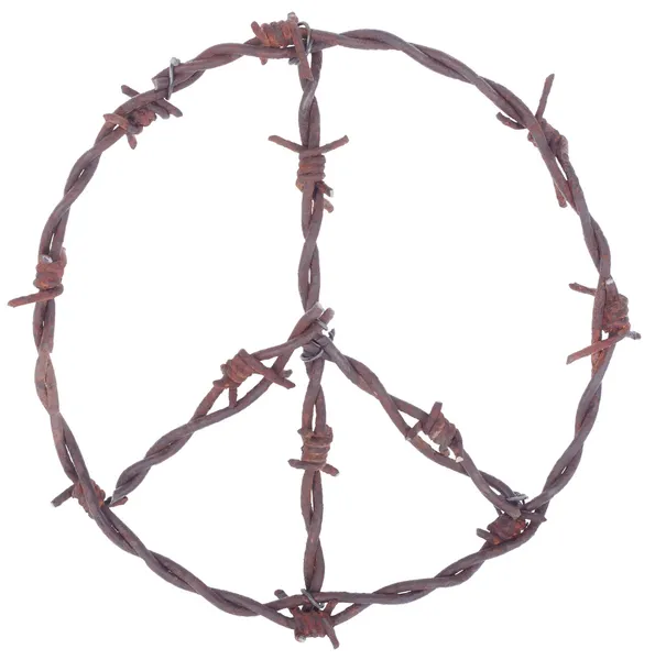 Rusty barbed wire peace sign Royalty Free Stock Photos