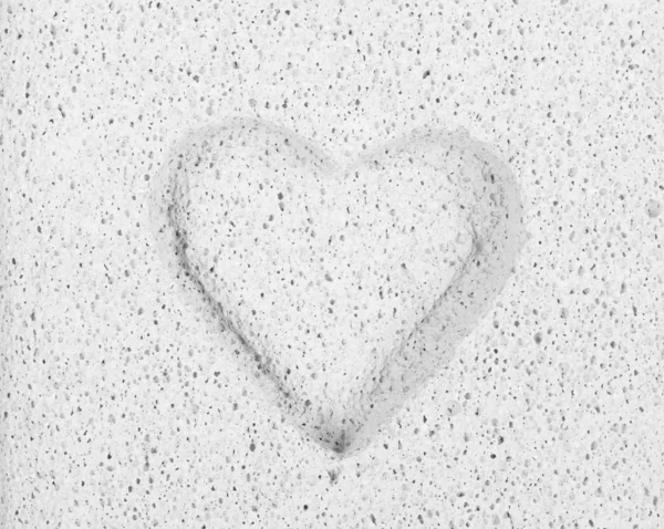 Ανάγλυφες καρδιά σε πέτρα Εικόνα Αρχείου