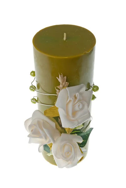 Large green candle with the flower decoration — Stock Photo, Image