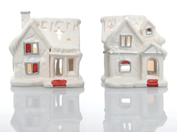 Stock image Two white houses Christmas decorations