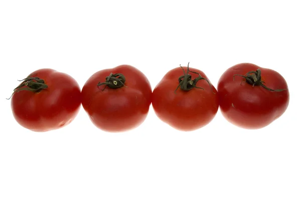 Τέσσερις Κόκκινες Ντομάτες Που Απομονώνονται Λευκό Φόντο — Φωτογραφία Αρχείου