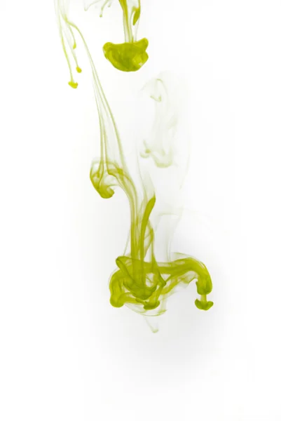 Green ink splash flowing in water — Stock Photo, Image