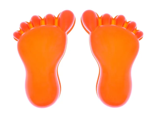 Feet forms beach toys — Stock Photo, Image