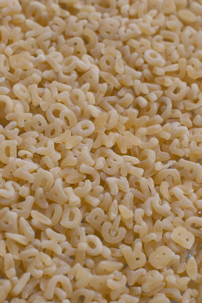 Close Achtergrond Van Alfabet Noodle Weergegeven Brieven — Stockfoto