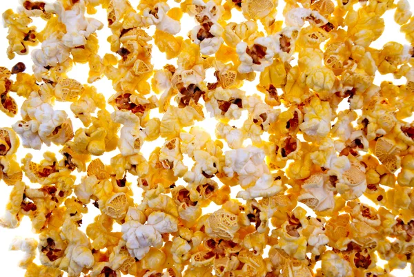 Popcorn als Hintergrund — Stockfoto