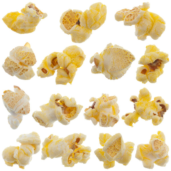 Popped kernels of pop corn snack isolated on white background.