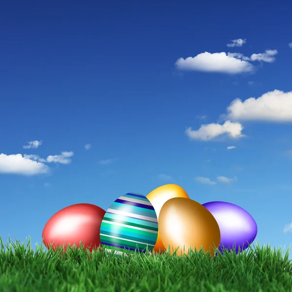 Huevos de Pascua de colores en la hierba — Foto de Stock