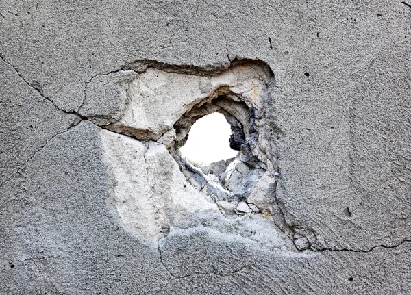 Díra v betonu — Stock fotografie